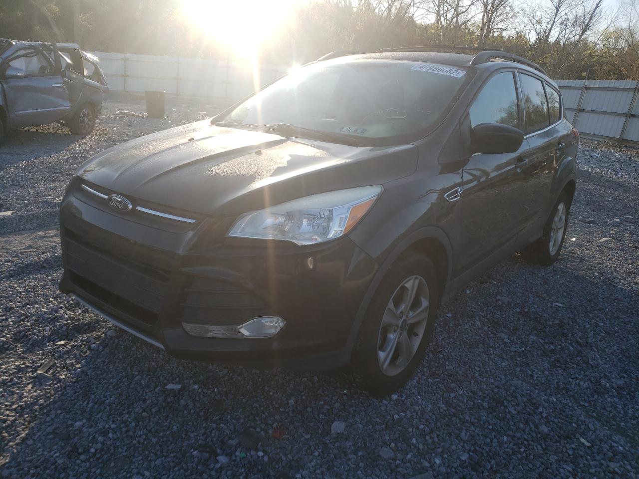 Photo 2 from auction – 2013 FORD ESCAPE SE with VIN 1FMCU0GX3DUC30565