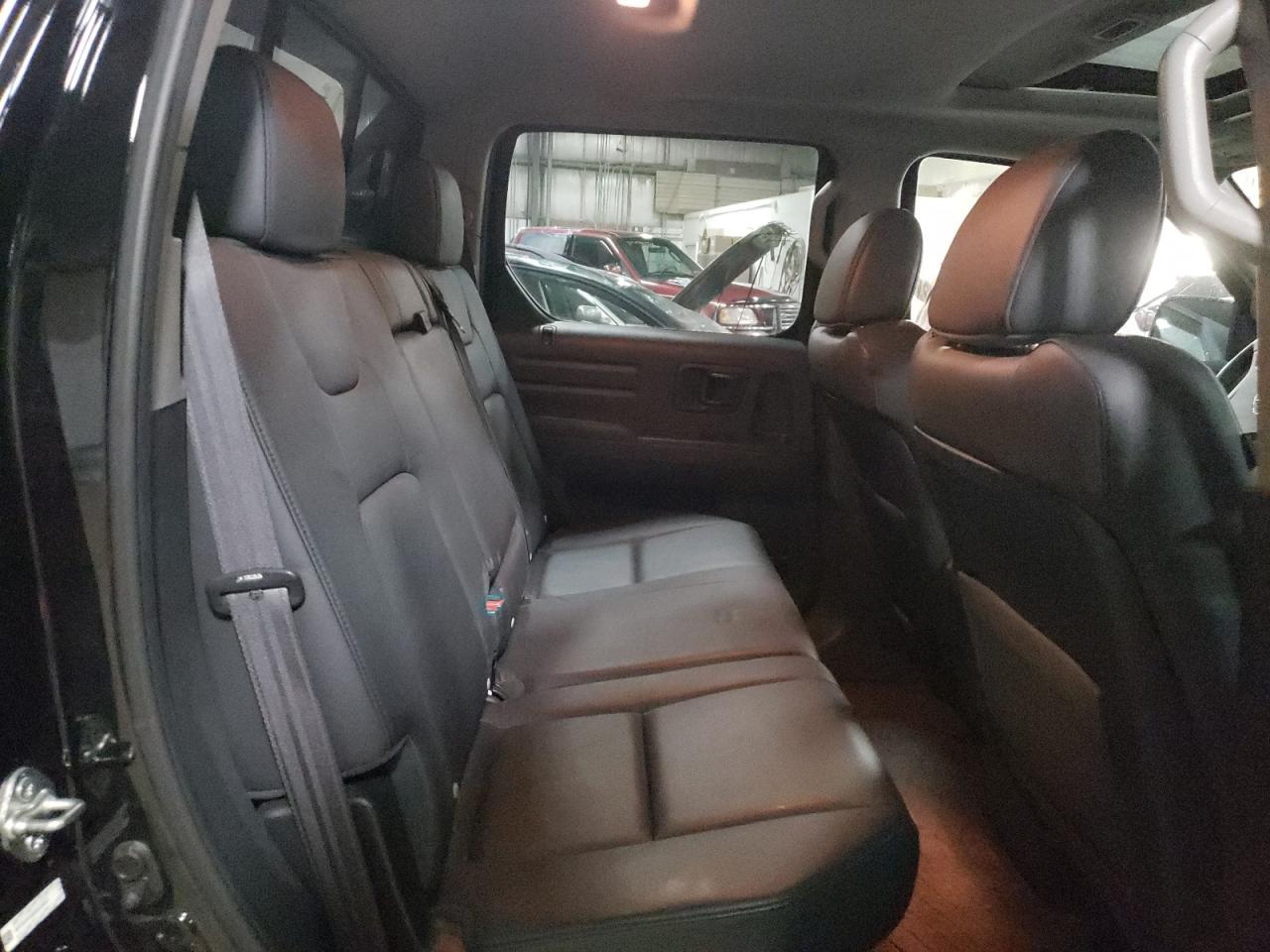 Photo 6 from auction – 2013 HONDA RIDGELINE with VIN 5FPYK1F58DB005547