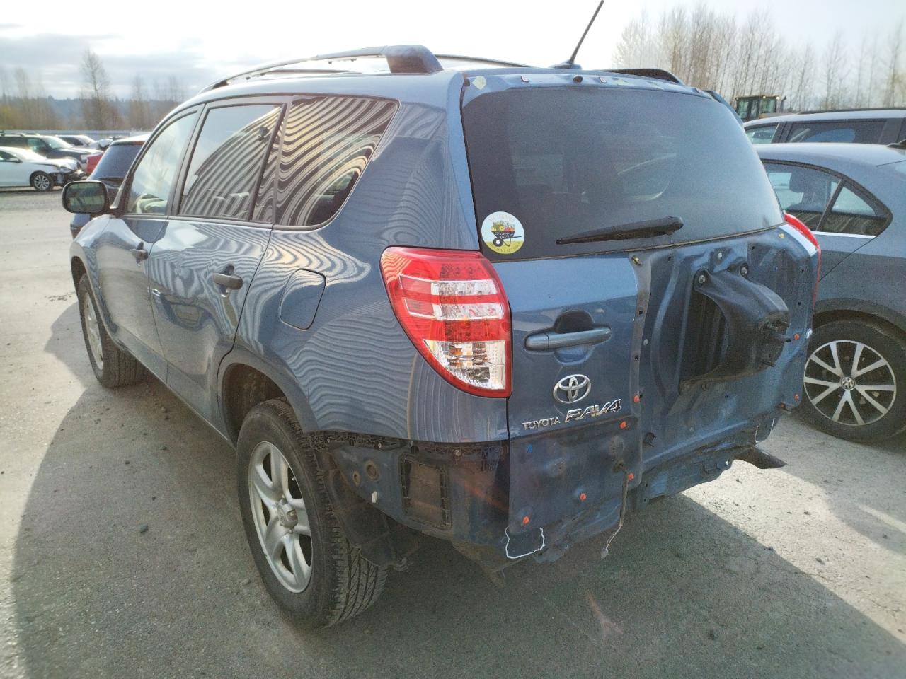Photo 3 from auction – 2009 TOYOTA RAV4 with VIN JTMBF33VX9D010766