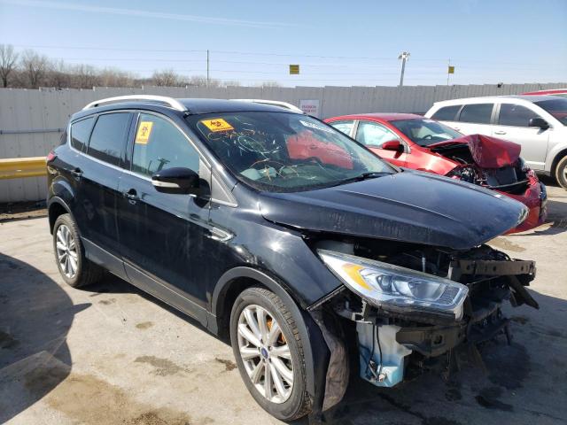 FORD ESCAPE TIT 2017 with VIN 1FMCU0JD0HUC38076 - Photo from auction