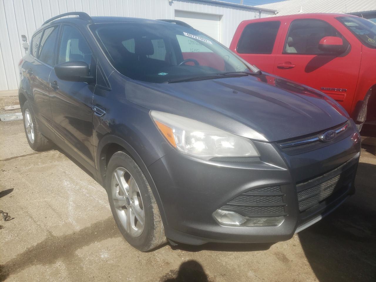 FORD ESCAPE 2014 with VIN 1FMCU0GXXEUC28880 - Photo from auction