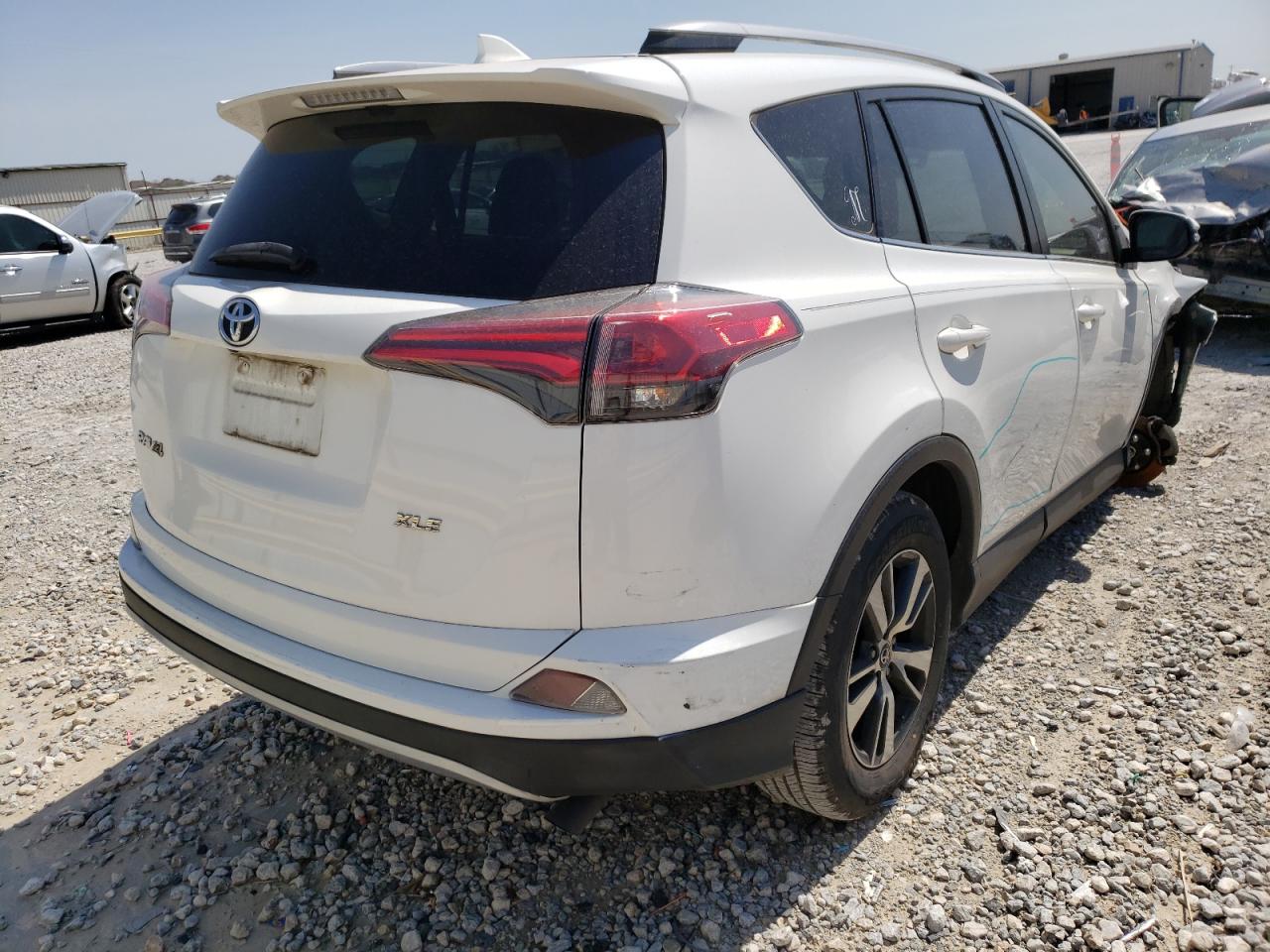 Photo 4 from auction – 2017 TOYOTA RAV4 XLE with VIN JTMWFREV6HJ719082