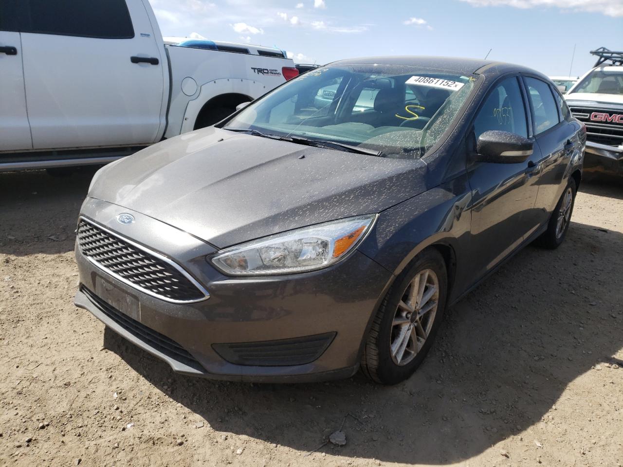 Photo 2 from auction – 2016 FORD FOCUS SE with VIN 1FADP3F24GL263761