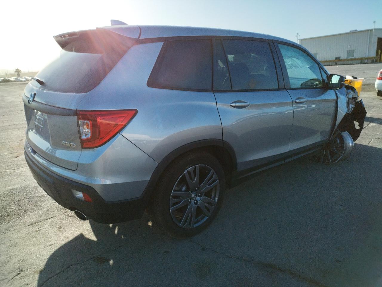 Photo 4 from auction – 2021 HONDA PASSPORT E with VIN 5FNYF8H54MB040539