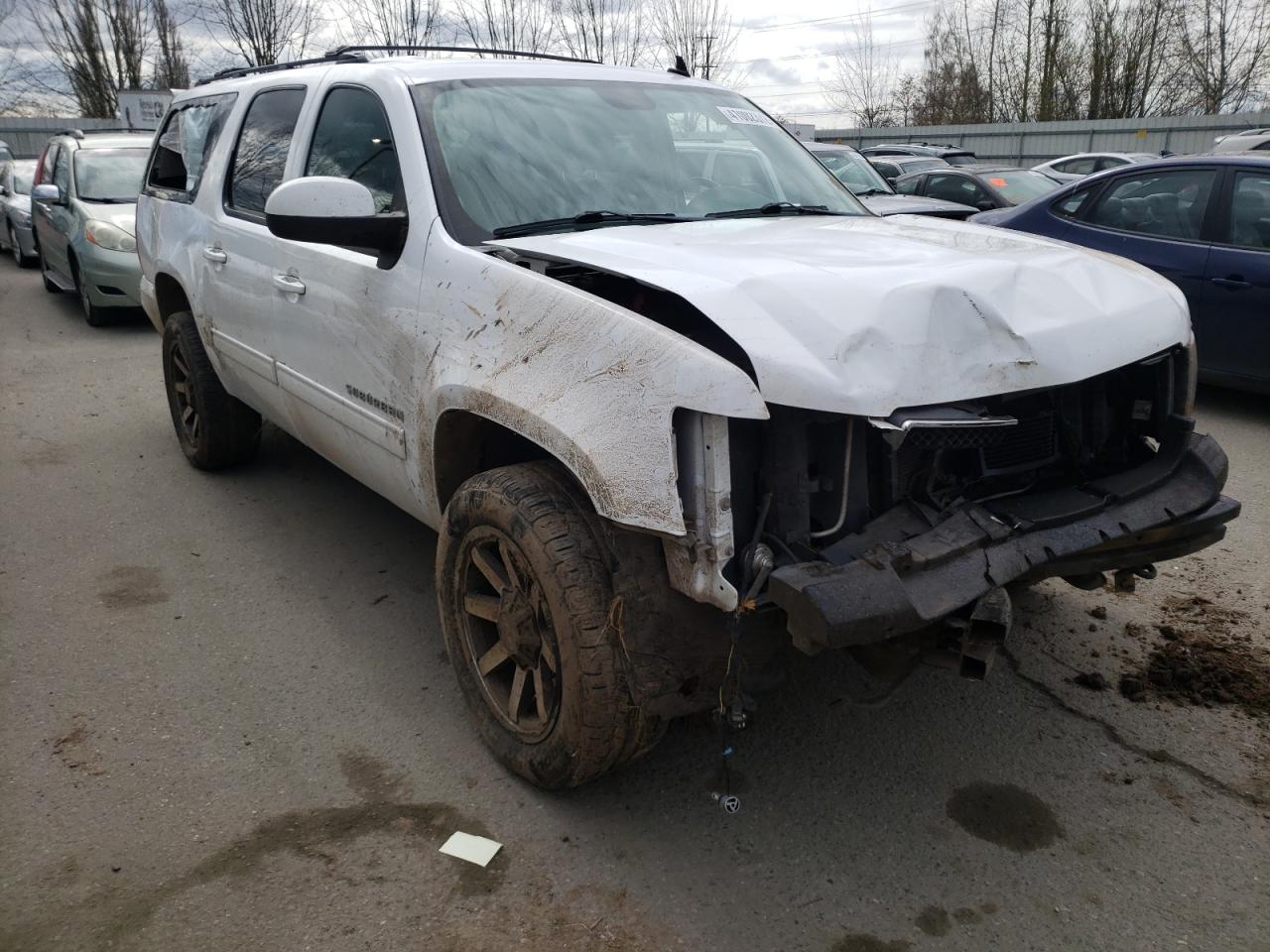 CHEVROLET SUBURBAN K 2011 with VIN 1GNSKHE31BR279341 - Photo from auction