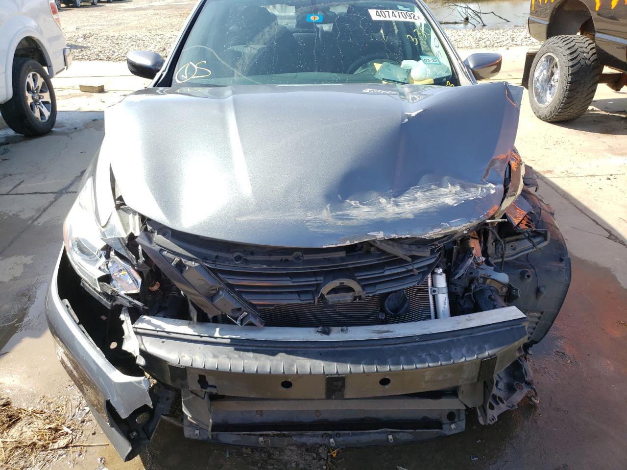 Photo 9 from auction – 2016 NISSAN ALTIMA 2.5 with VIN 1N4AL3AP7GC164076