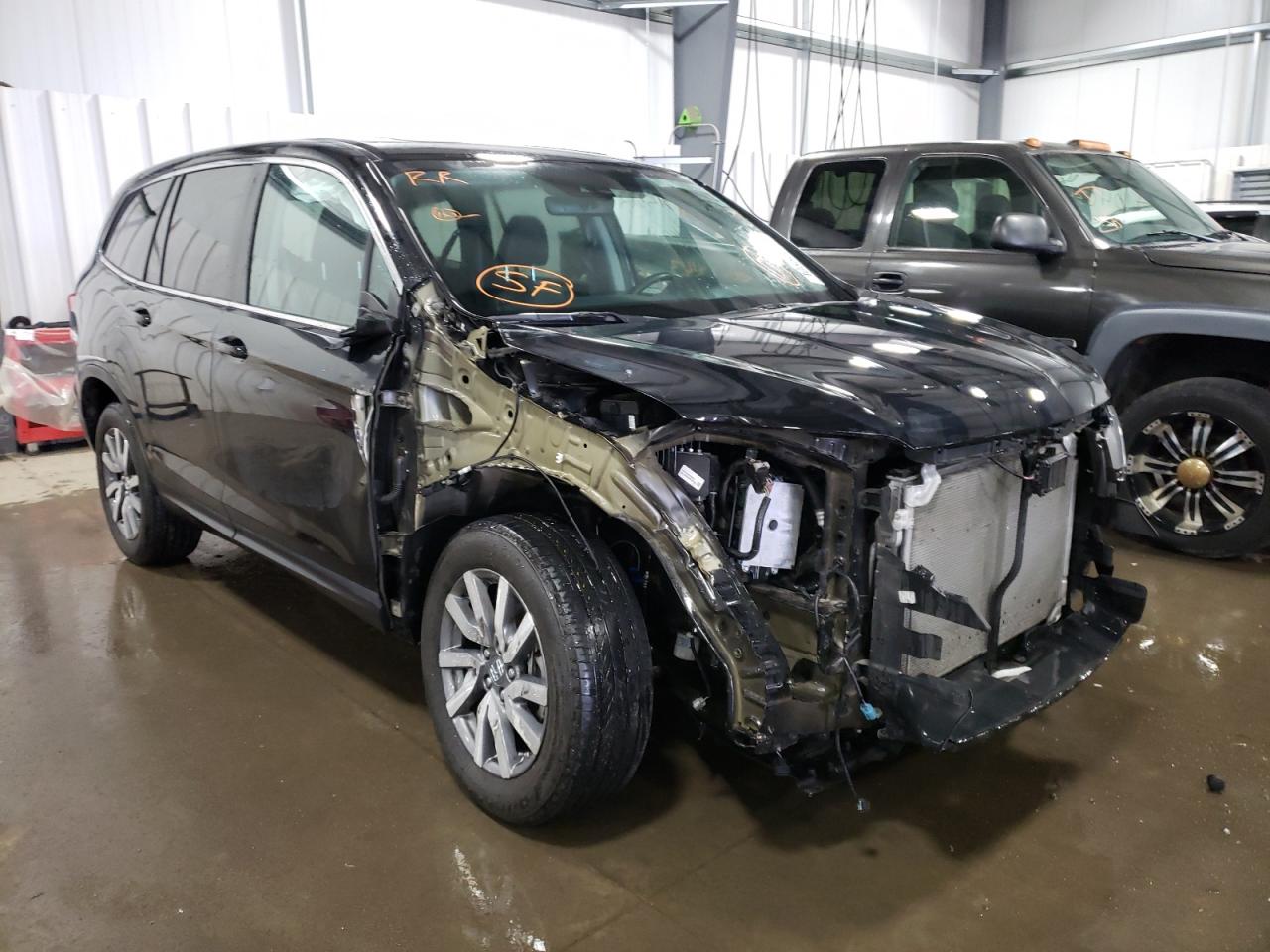 HONDA PILOT EXL 2020 with VIN 5FNYF6H57LB046404 - Photo from auction