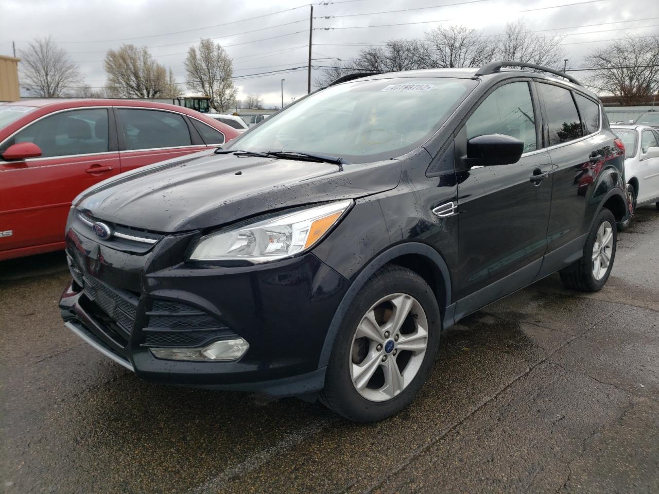 Photo 2 from auction – 2016 FORD ESCAPE SE with VIN 1FMCU0GXXGUC40594