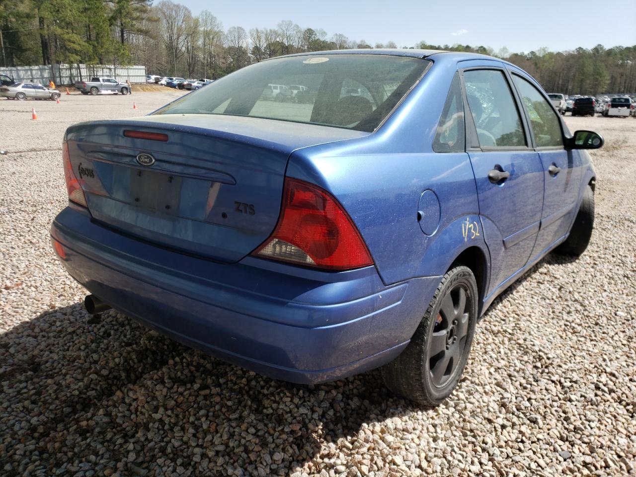 Photo 4 from auction – 2004 FORD FOCUS with VIN 1FAHP38Z54W143165
