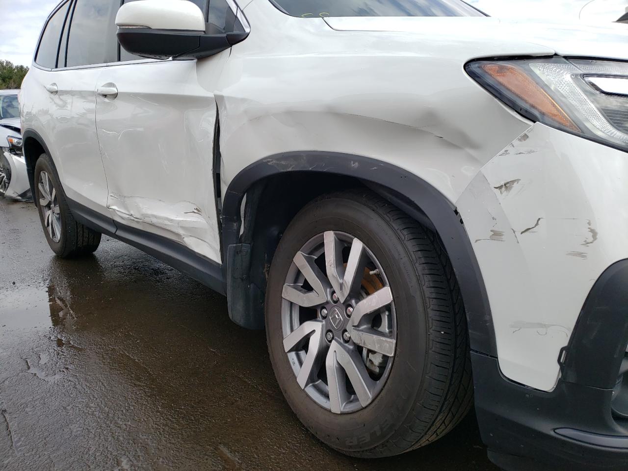Photo 9 from auction – 2021 HONDA PILOT EXL with VIN 5FNYF6H57MB042306