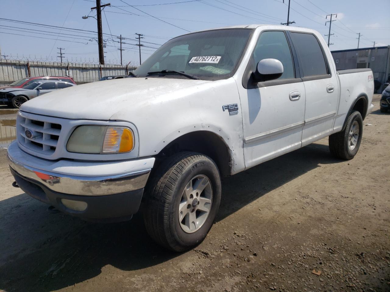 Photo 2 from auction – 2003 FORD F150 SUPER with VIN 1FTRW08L73KD82878
