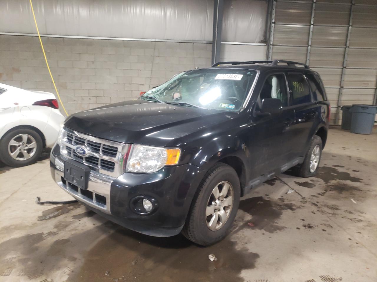 Photo 2 from auction – 2011 FORD ESCAPE LIM with VIN 1FMCU0E78BKB13950