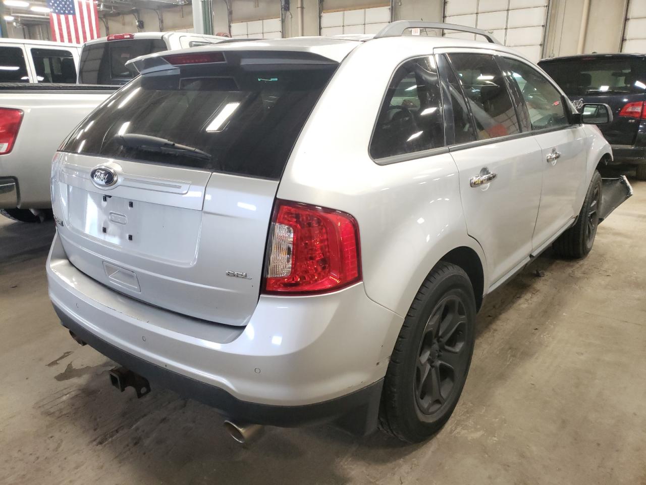 Photo 4 from auction – 2011 FORD EDGE SEL with VIN 2FMDK3JC2BBB41350