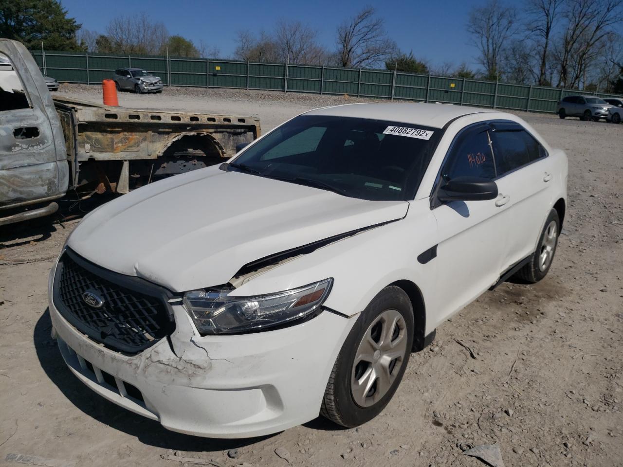 Photo 2 from auction – 2013 FORD TAURUS POL with VIN 1FAHP2L82DG132367