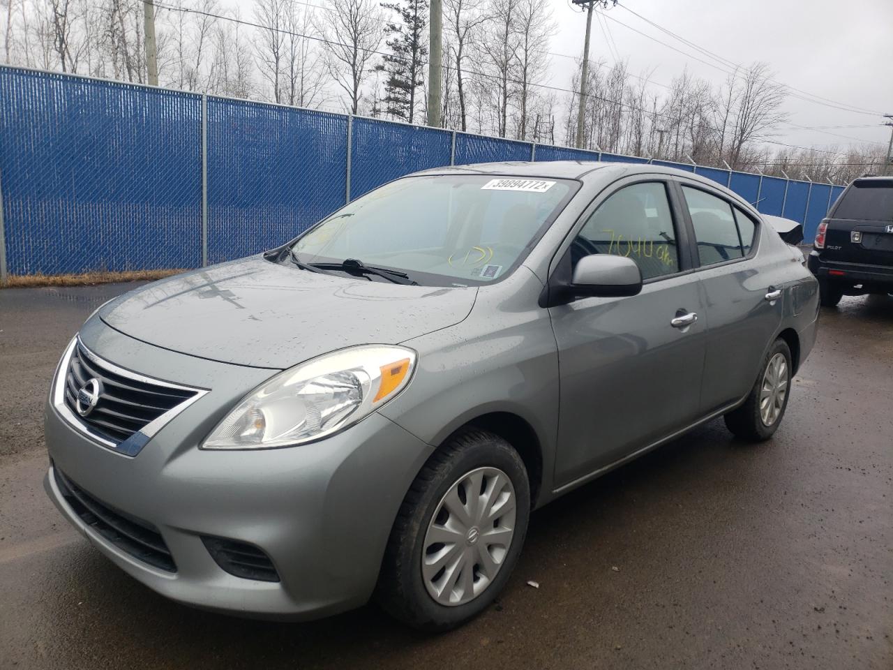 Photo 2 from auction – 2012 NISSAN VERSA S with VIN 3N1CN7AP9CL921176