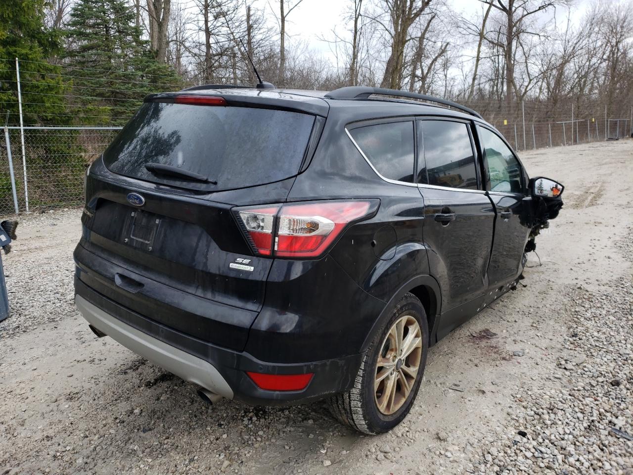 Photo 4 from auction – 2017 FORD ESCAPE SE with VIN 1FMCU0GD3HUB51330