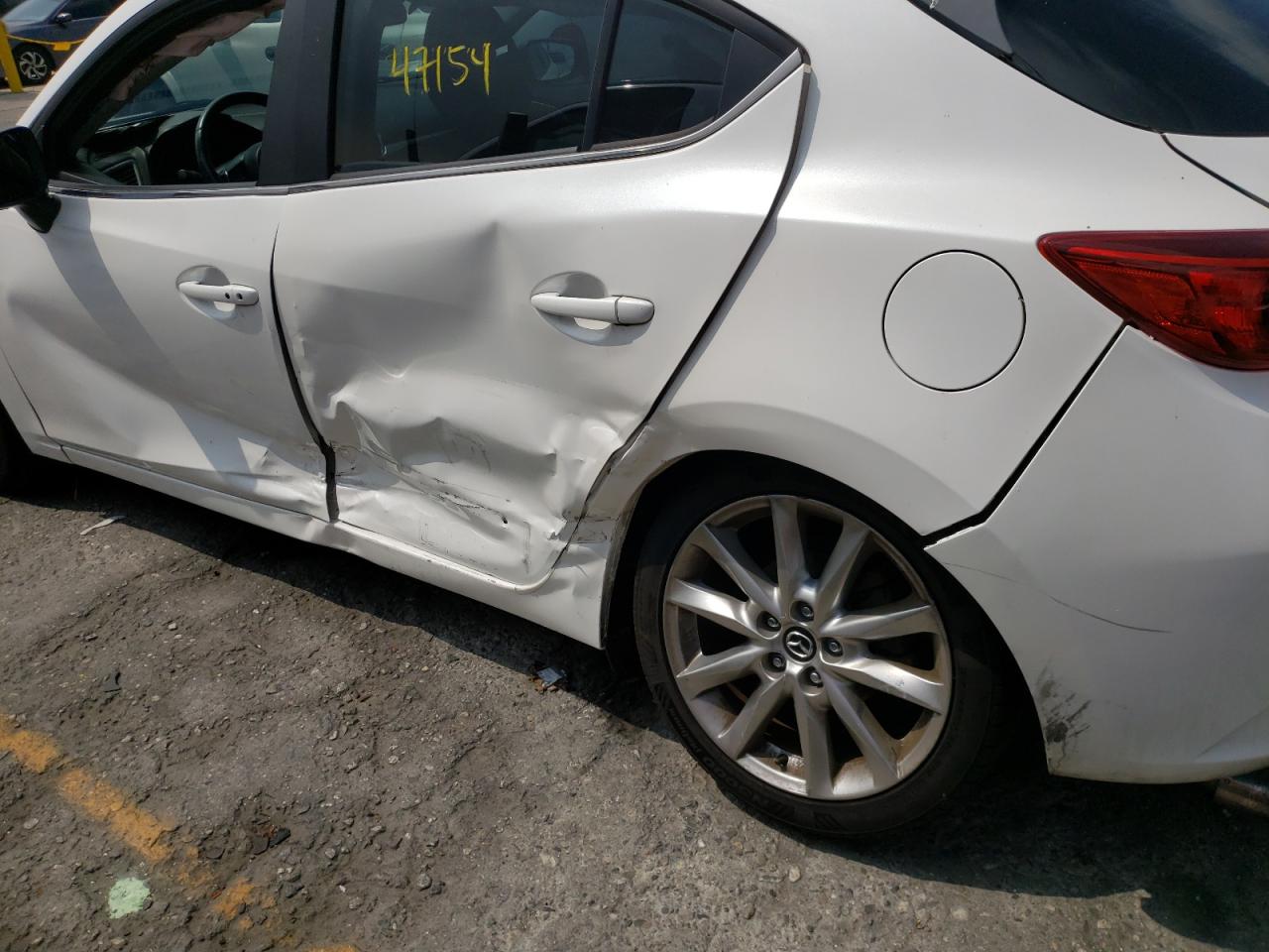 Photo 9 from auction – 2017 MAZDA 3 TOURING with VIN 3MZBN1L75HM152192