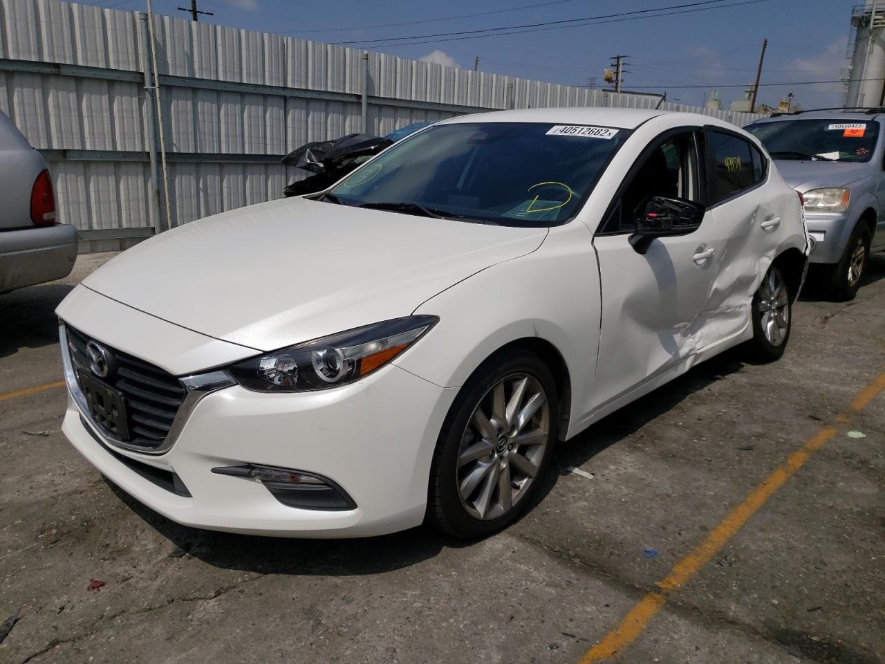 Photo 2 from auction – 2017 MAZDA 3 TOURING with VIN 3MZBN1L75HM152192