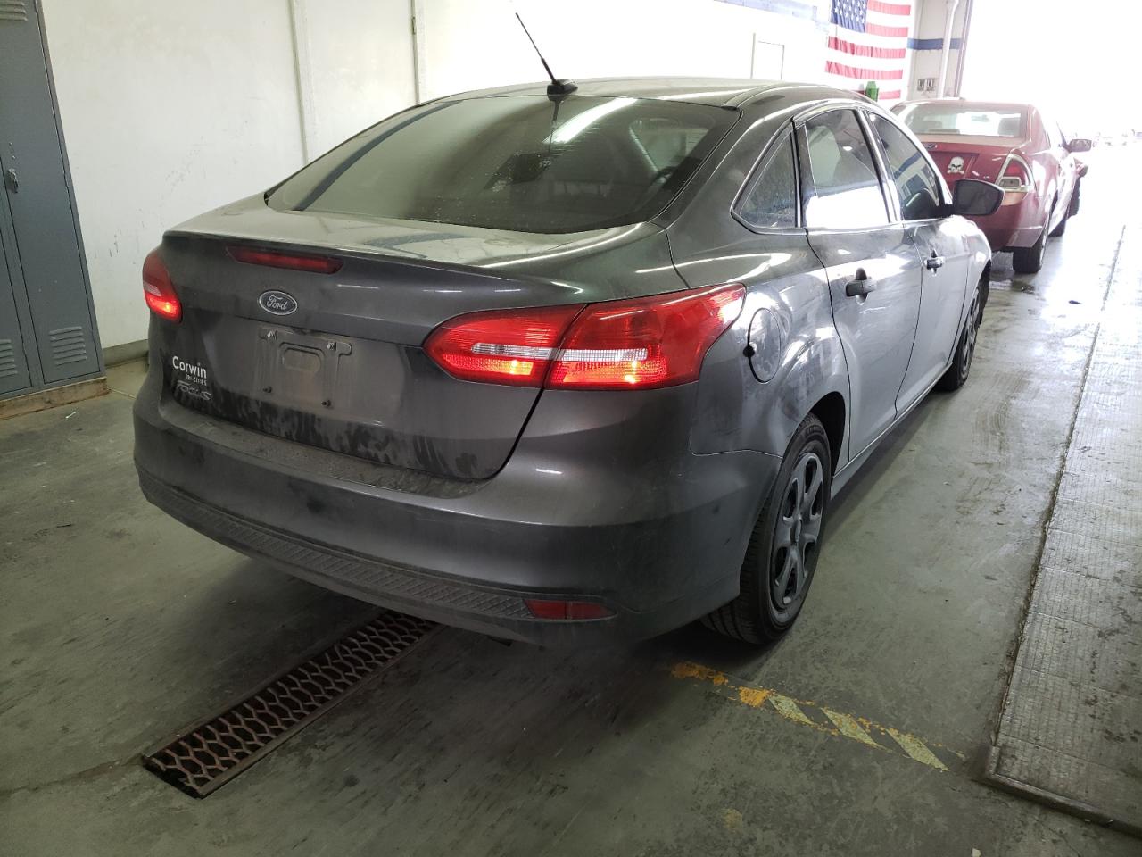 Photo 4 from auction – 2015 FORD FOCUS S with VIN 1FADP3E21FL281702
