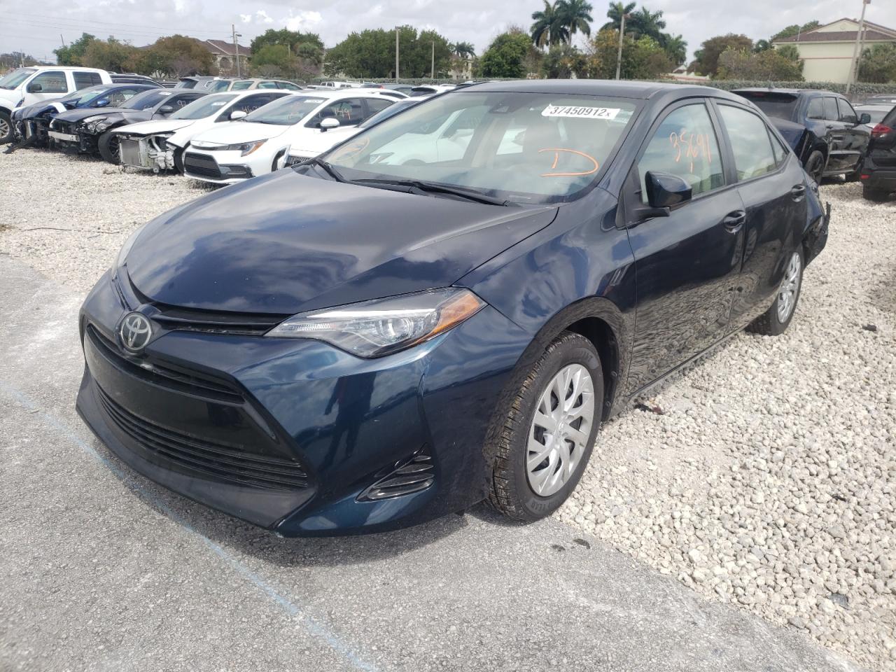 Photo 2 from auction – 2018 TOYOTA COROLLA L with VIN 5YFBURHE8JP839712