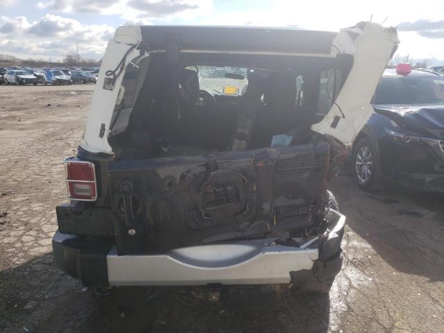 Photo 9 from auction – 2011 JEEP WRANGLER U with VIN 1J4BA5H11BL632291