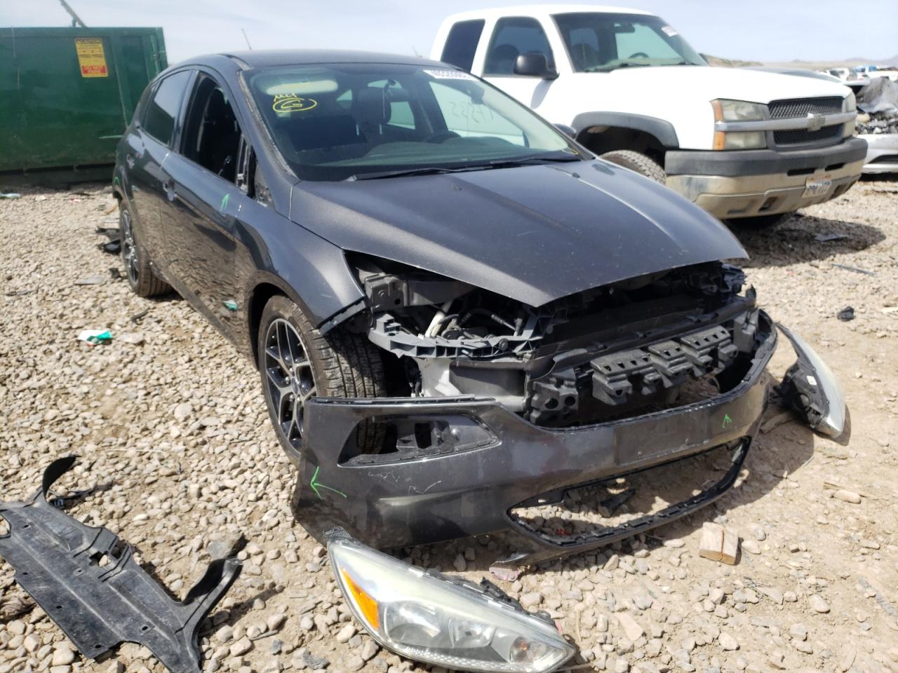 FORD FOCUS SE 2015 with VIN 1FADP3K26FL306369 - Photo from auction