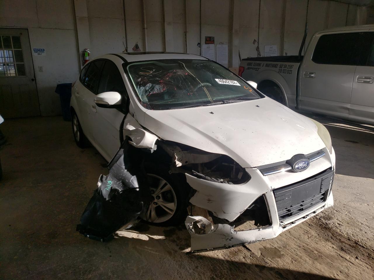FORD FOCUS SE 2014 with VIN 1FADP3K20EL318094 - Photo from auction