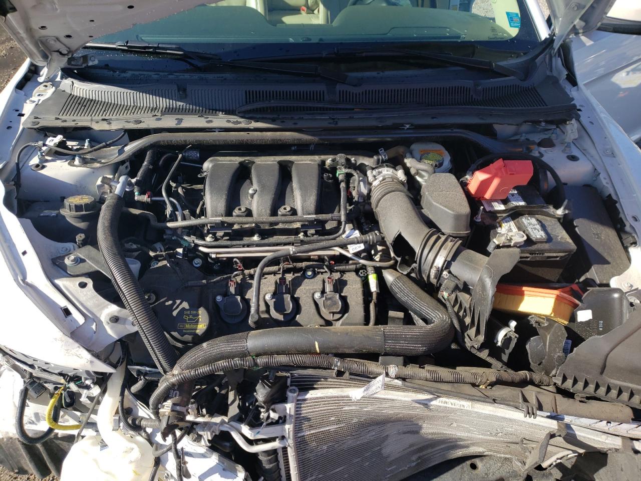 Photo 7 from auction – 2014 FORD TAURUS SEL with VIN 1FAHP2E8XEG132776