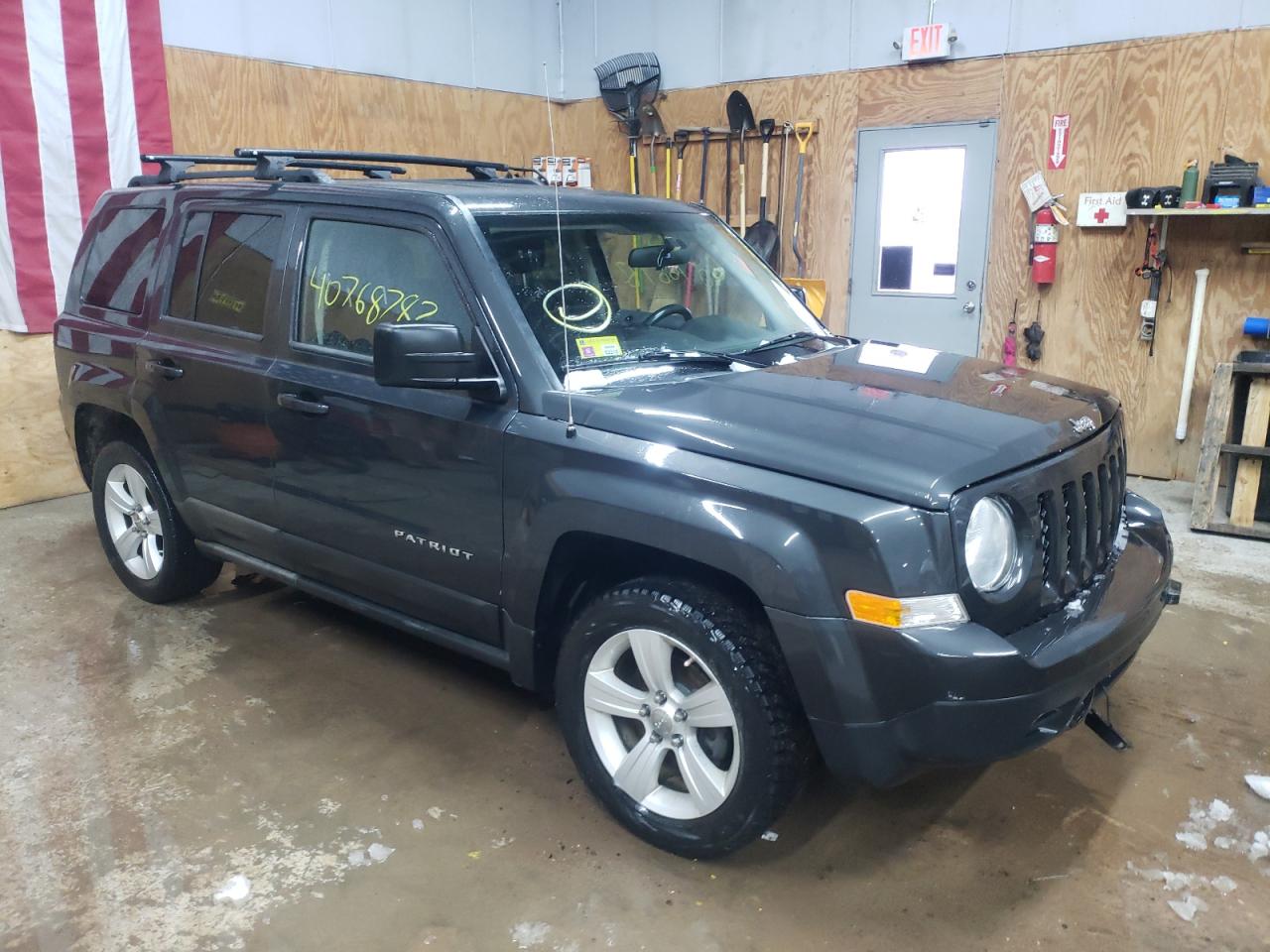 JEEP PATRIOT 2011 with VIN 1J4NF2GB4BD115259 - Photo from auction