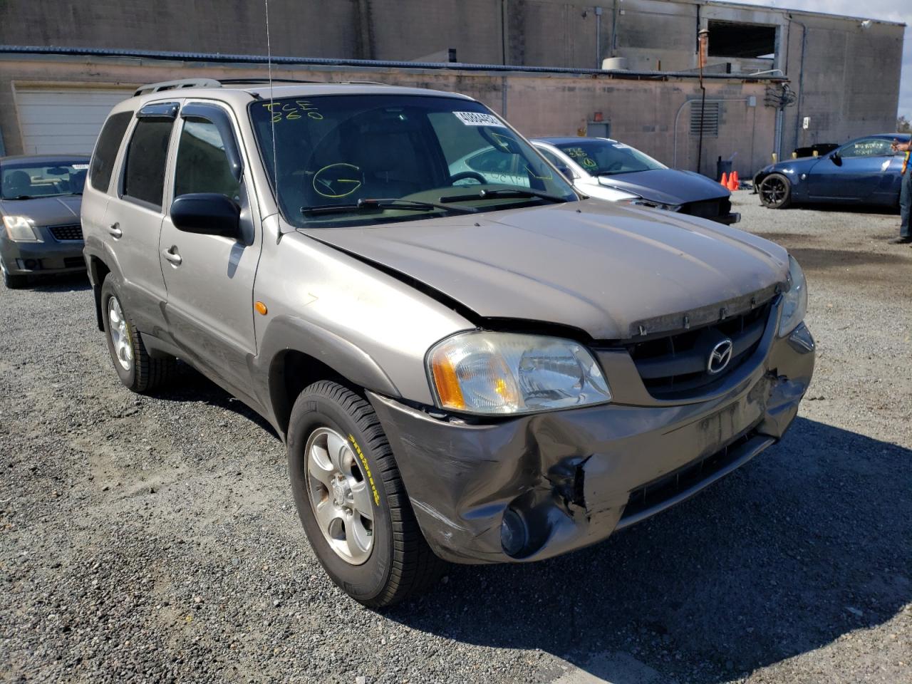 MAZDA TRIBUTE LX 2002 with VIN 4F2CU08182KM10051 - Photo from auction