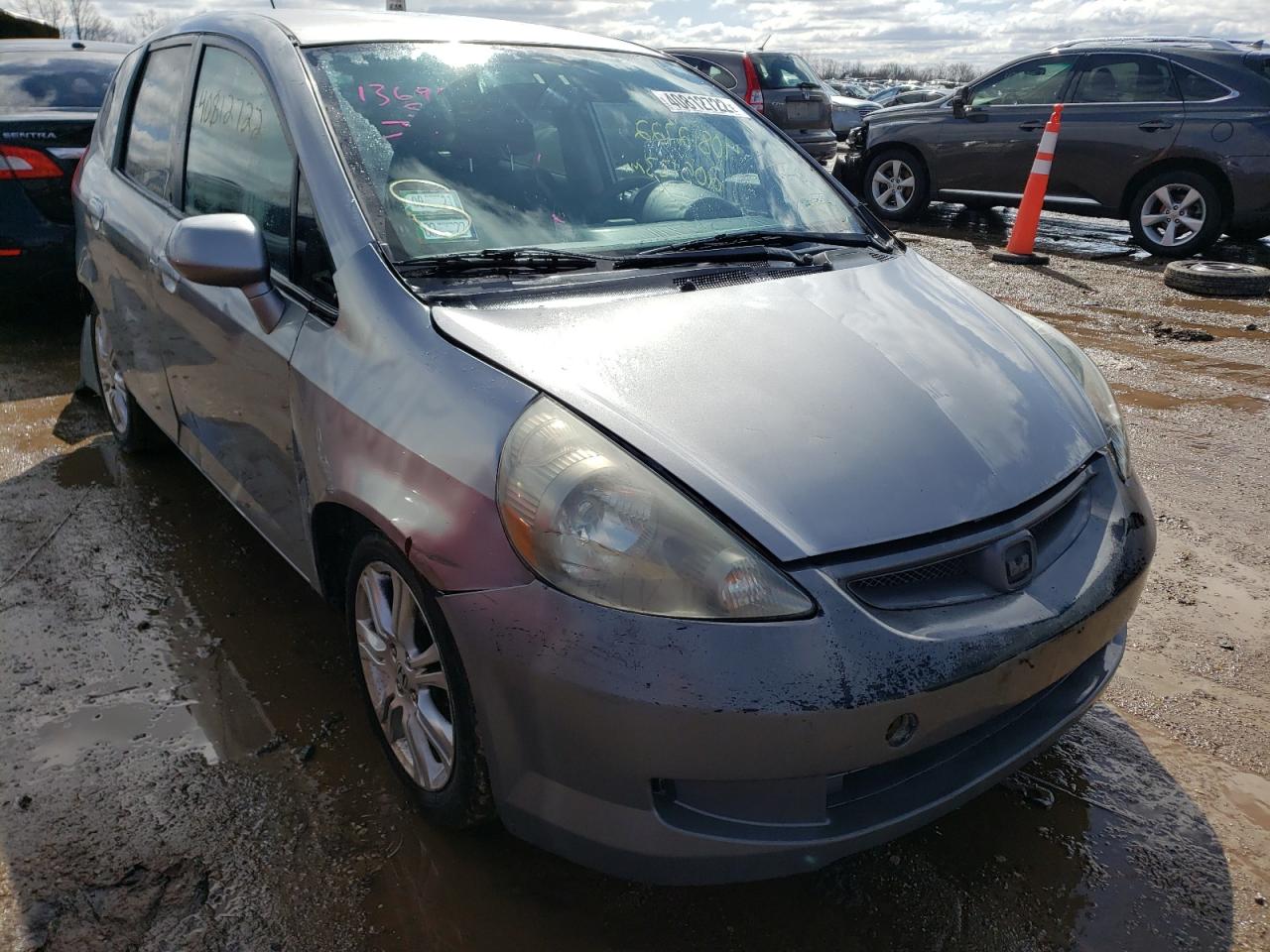 HONDA FIT 2007 with VIN JHMGD38457S012296 - Photo from auction