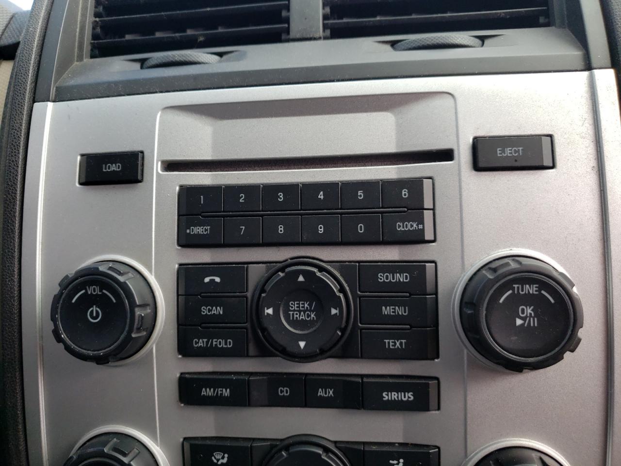 Photo 9 from auction – 2009 MERCURY MARINER with VIN 4M2CU81G09KJ07850
