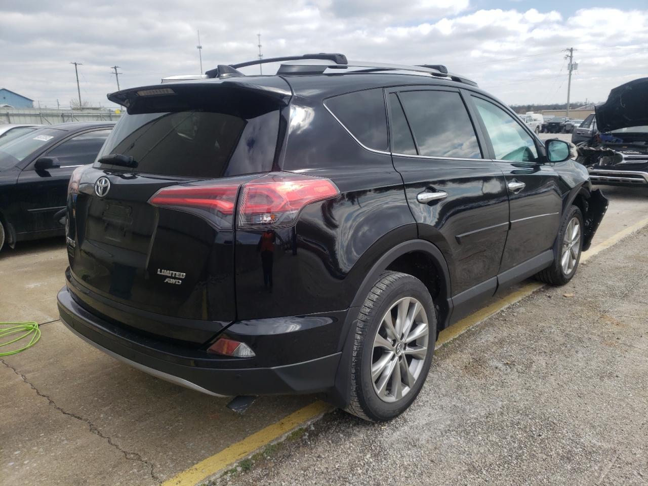Photo 4 from auction – 2017 TOYOTA RAV4 LIMIT with VIN 2T3DFREV0HW673984