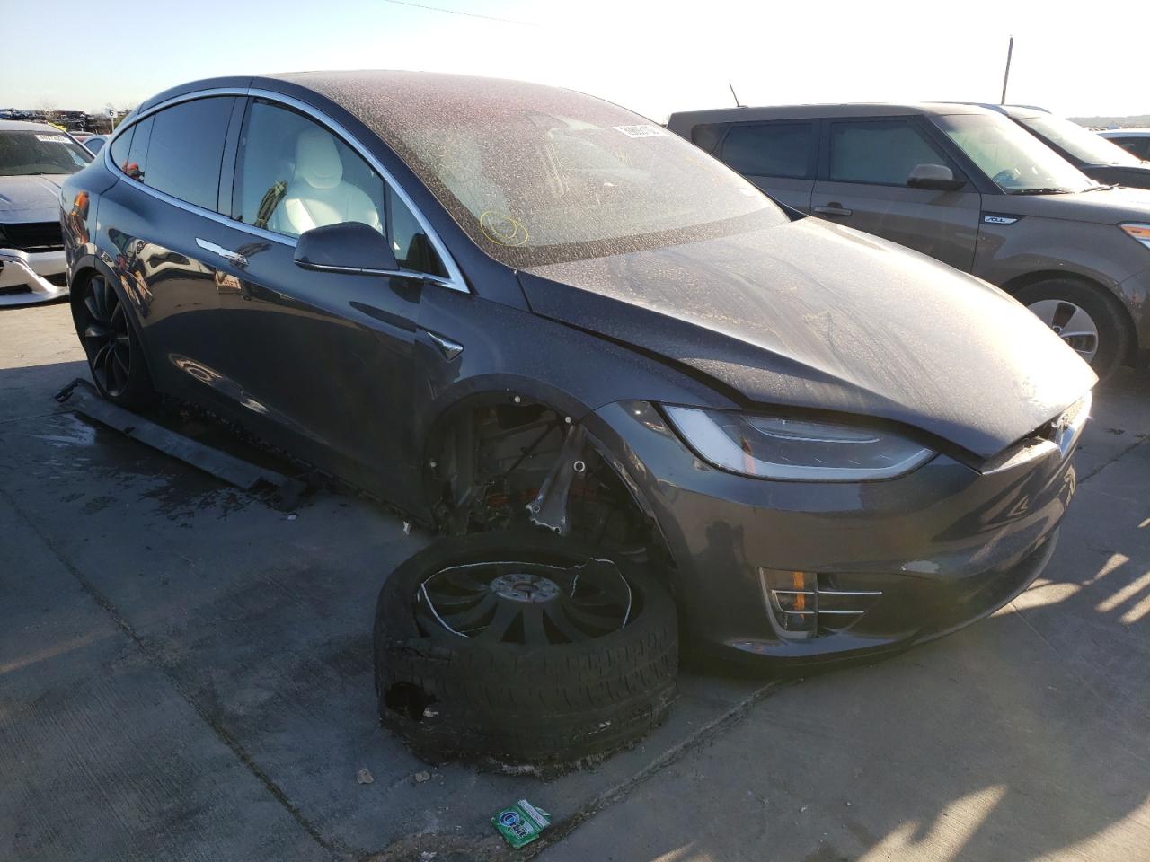 TESLA MODEL X 2018 with VIN 5YJXCDE4XJF090107 - Photo from auction