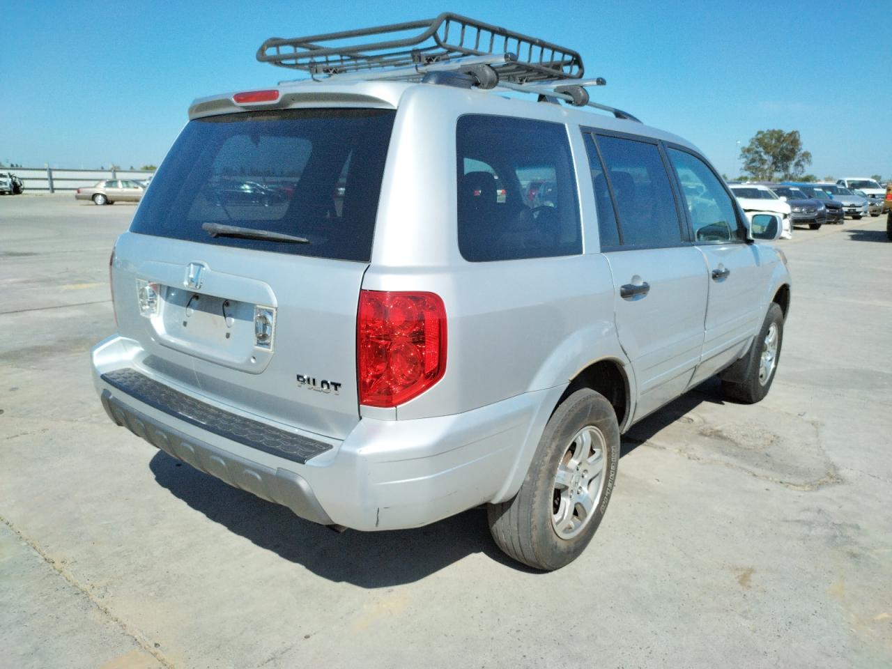 Photo 4 from auction – 2004 HONDA PILOT EXL with VIN 2HKYF18614H502945