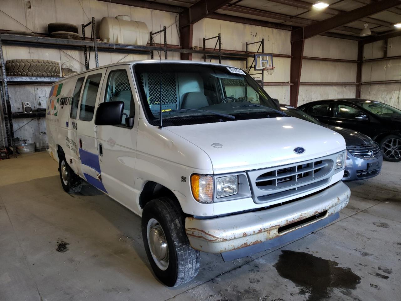 FORD ECONOLINE 2001 with VIN 1FTNS24L31HA98489 - Photo from auction