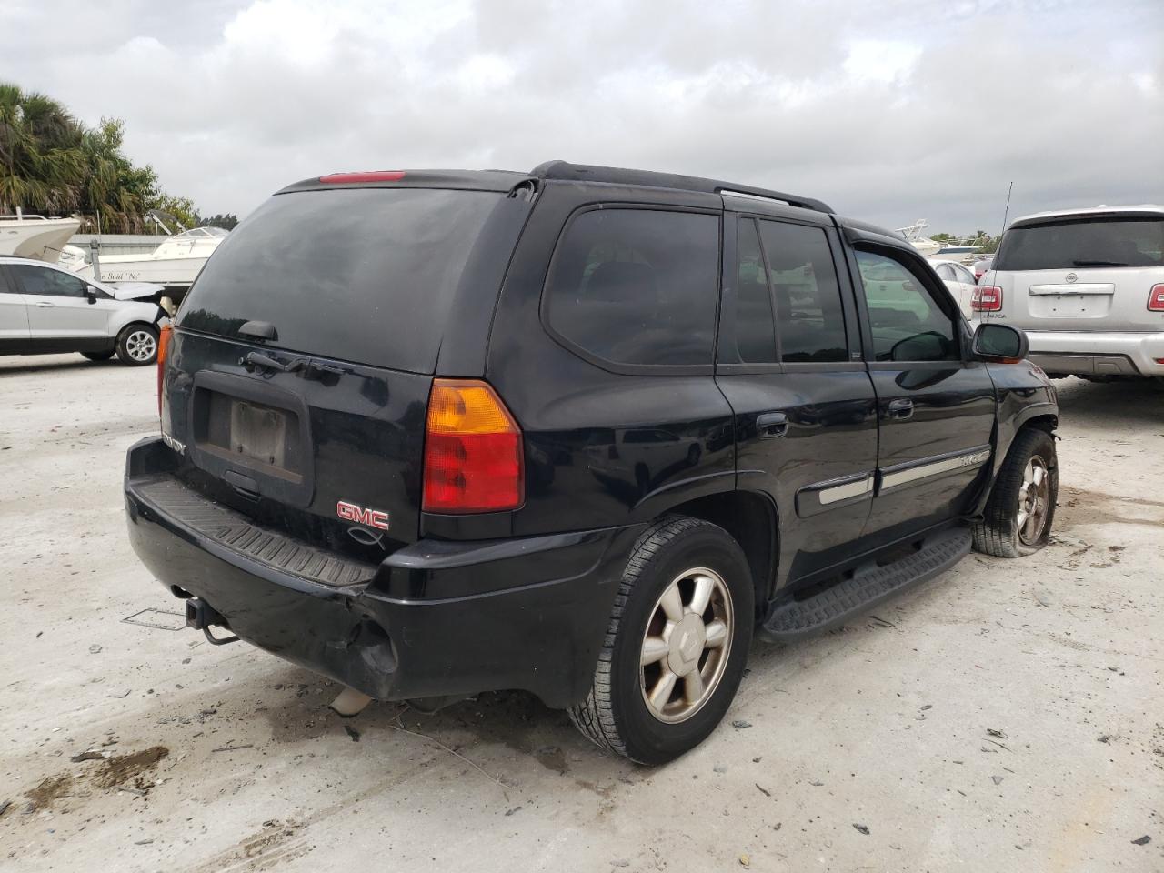 Photo 4 from auction – 2004 GMC ENVOY with VIN 1GKDT13S142320101