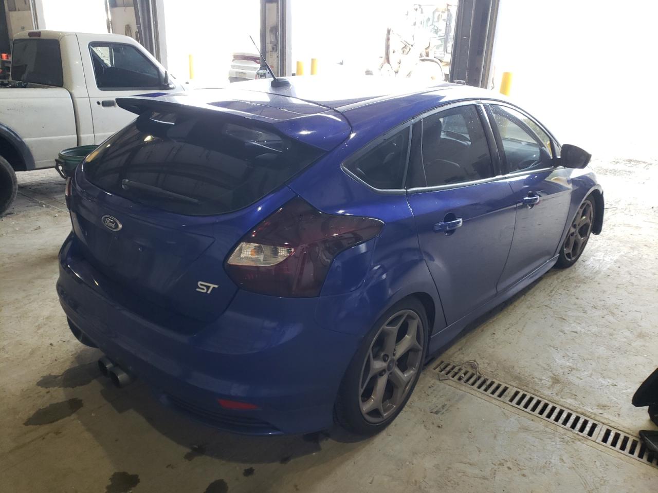 Photo 4 from auction – 2013 FORD FOCUS ST with VIN 1FADP3L97DL108800