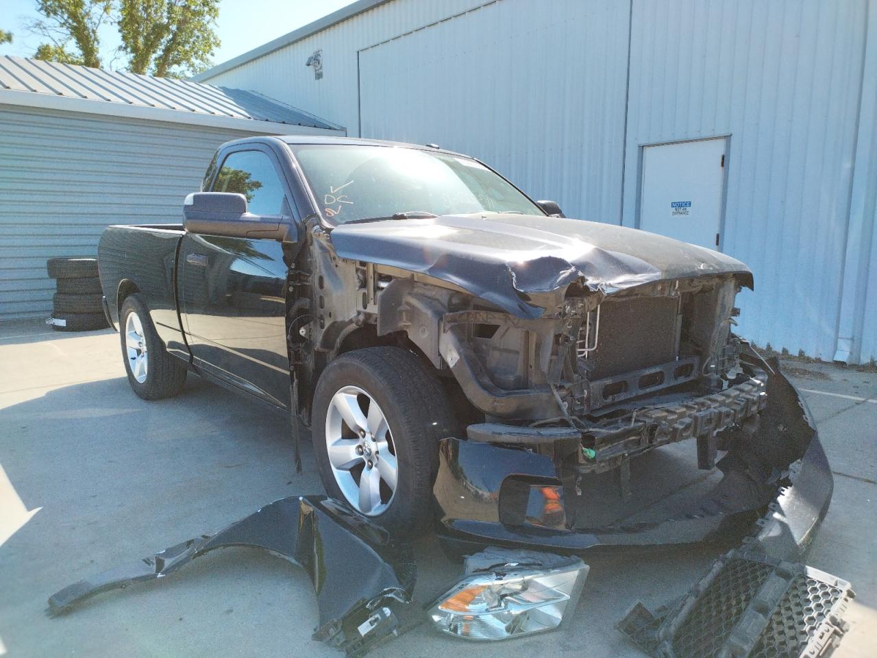 RAM 1500 ST 2013 with VIN 3C6JR6ATXDG511391 - Photo from auction