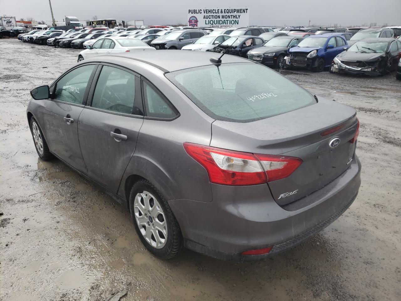 Photo 15 from auction – 2014 FORD FOCUS SE with VIN 1FADP3F23EL100872