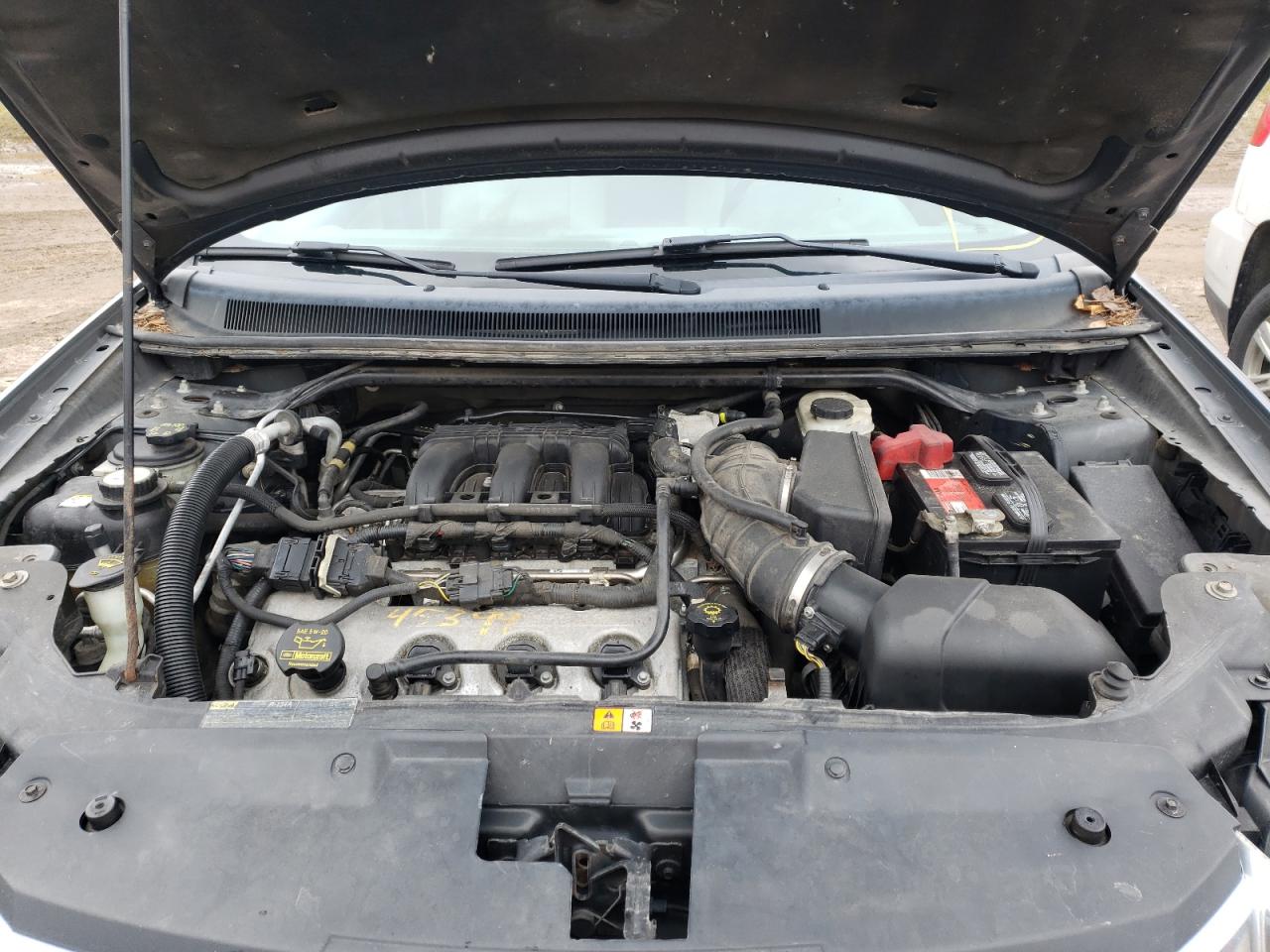 Photo 7 from auction – 2008 FORD TAURUS X S with VIN 1FMDK02W08GA26447