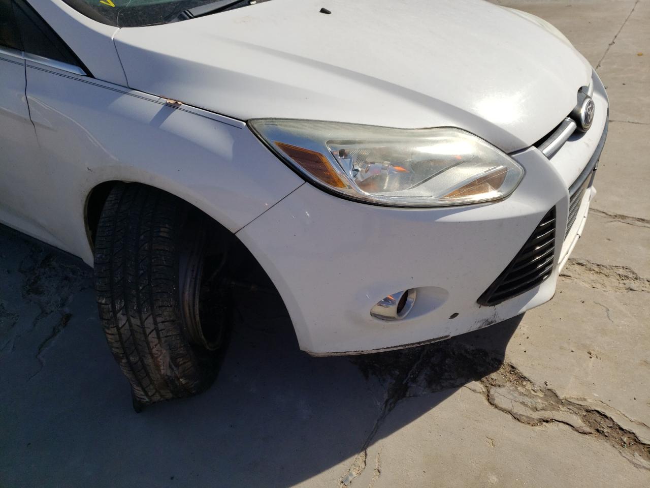 Photo 9 from auction – 2012 FORD FOCUS SEL with VIN 1FAHP3H28CL374841