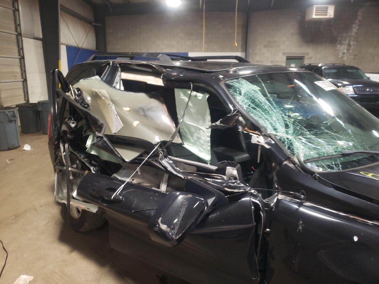 Photo 9 from auction – 2011 FORD ESCAPE LIM with VIN 1FMCU0E78BKB13950