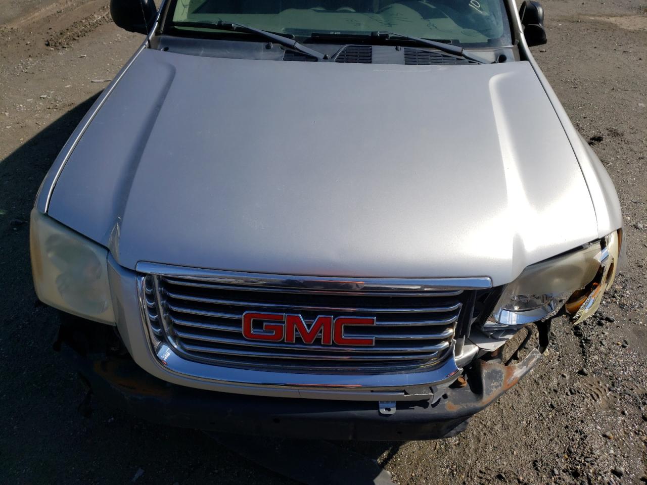 Photo 7 from auction – 2006 GMC ENVOY with VIN 1GKDS13S262341674