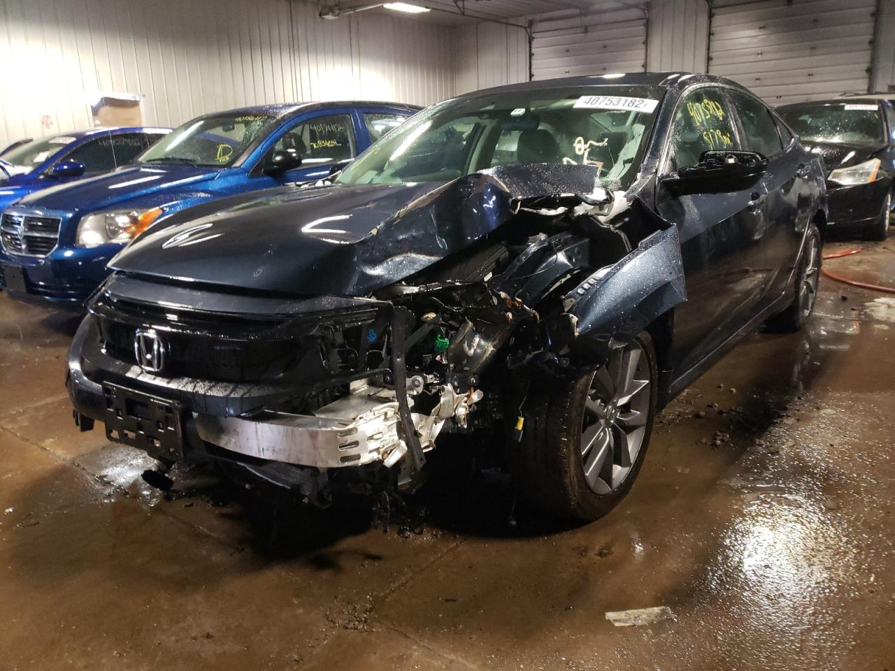 Photo 2 from auction – 2021 HONDA CIVIC EX with VIN 19XFC1F36ME011302