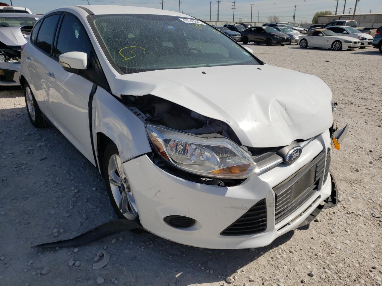 FORD FOCUS SE 2013 with VIN 1FADP3K23DL169923 - Photo from auction