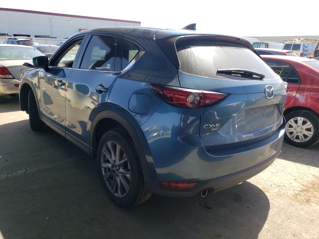 Photo 3 from auction – 2021 MAZDA CX-5 GRAND with VIN JM3KFBDM1M1359624
