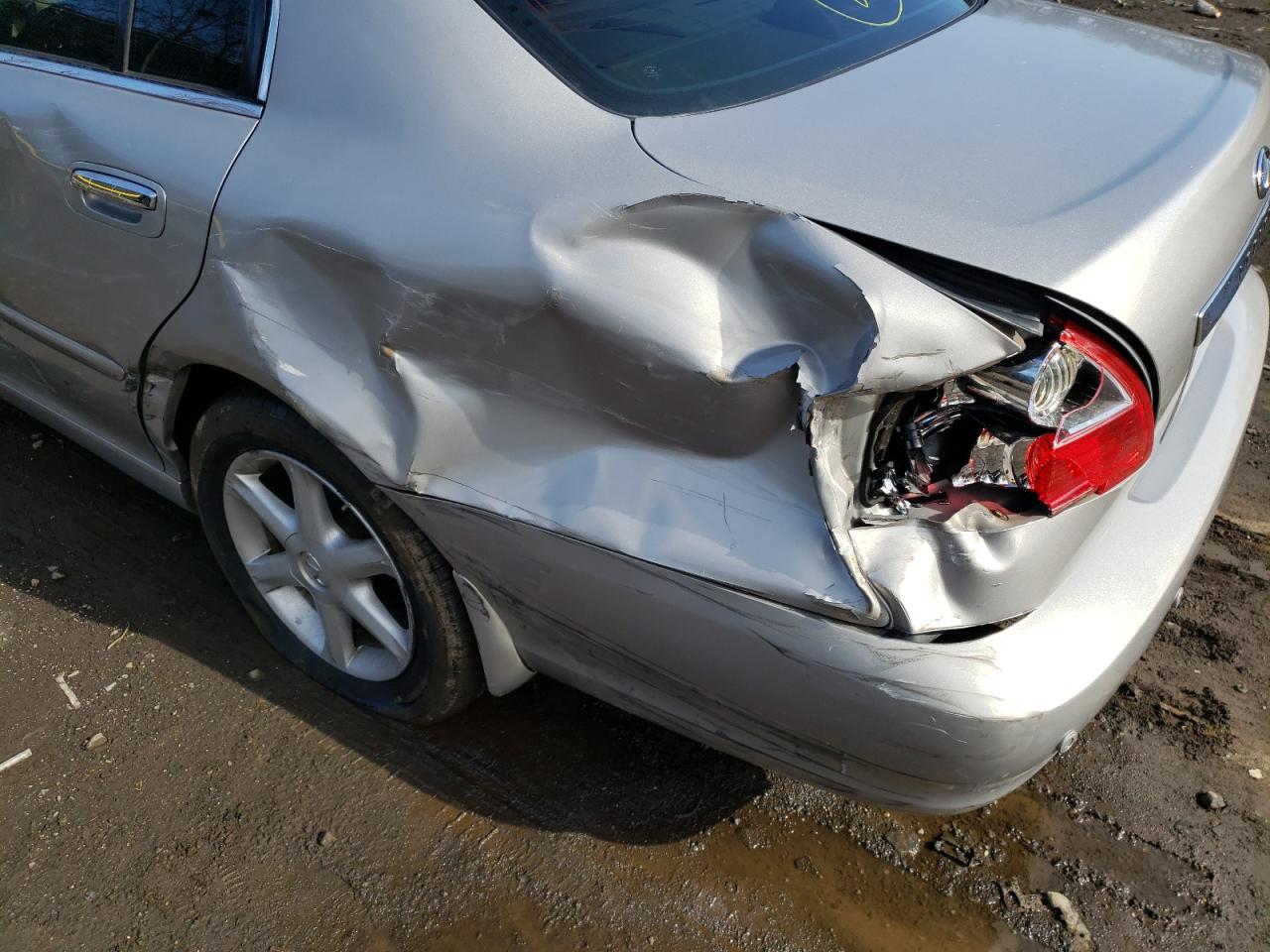 Photo 9 from auction – 2003 INFINITI Q45 with VIN JNKBF01A03M100206