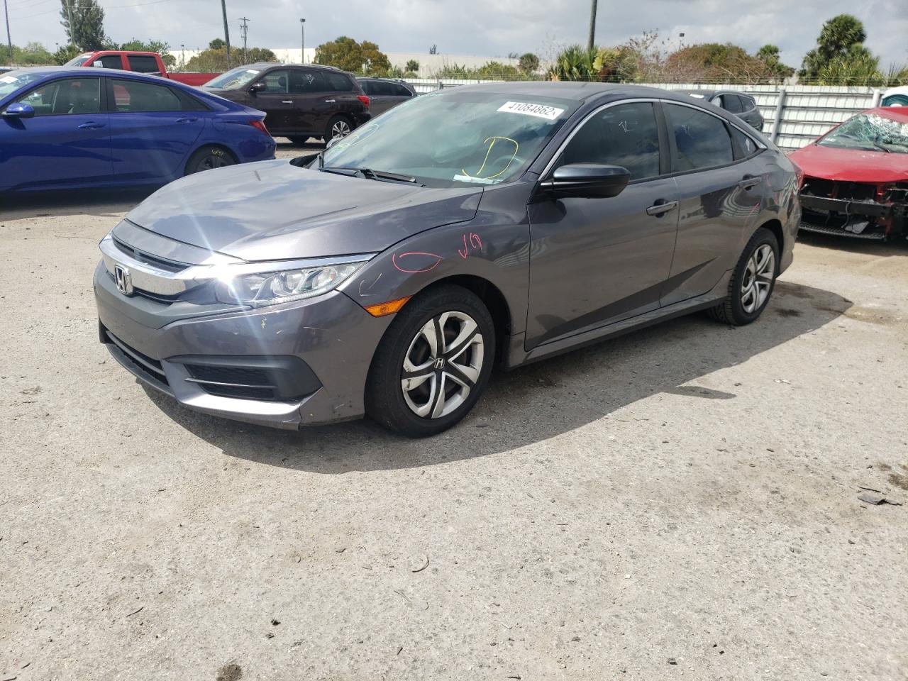 Photo 2 from auction – 2017 HONDA CIVIC LX with VIN 19XFC2F52HE041099