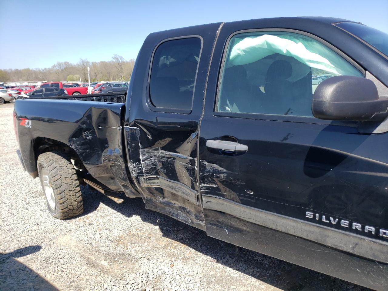 Photo 9 from auction – 2011 CHEVROLET SILVERADO with VIN 1GCRKSE32BZ393532